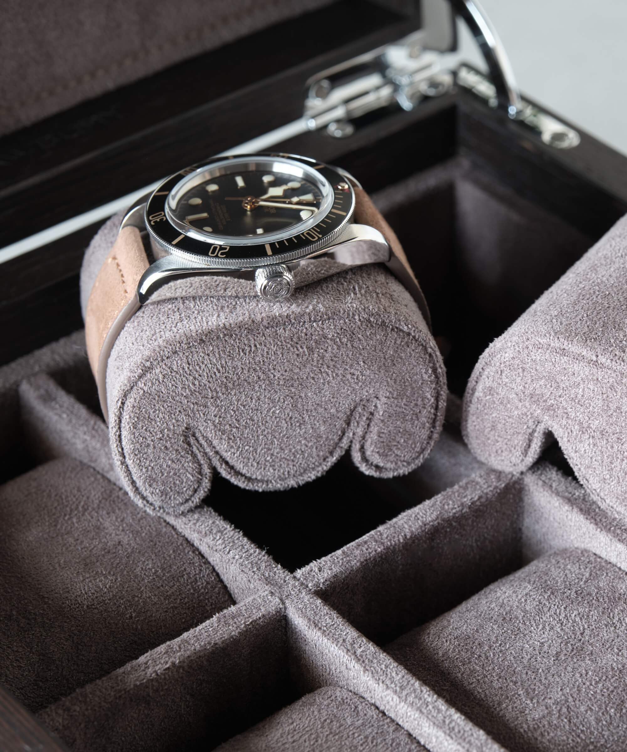 The TAWBURY Grove 6 Slot Watch Box with Solid Lid - Kassod is essential for any watch collection. Its sleek design perfectly showcases the stunning TAWBURY Tudor Black Bay timepieces.