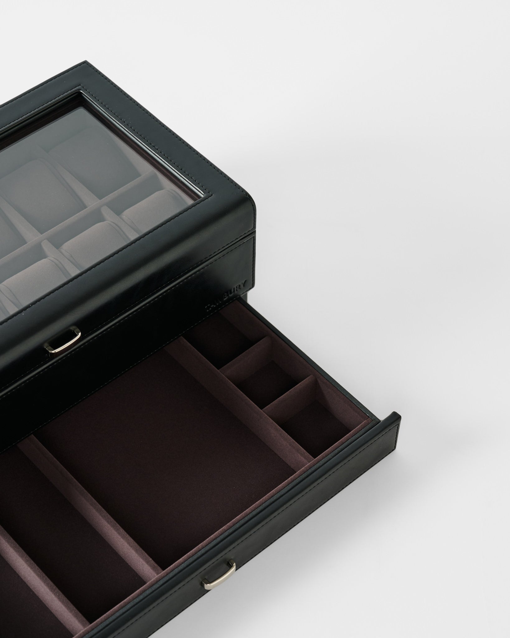 The TAWBURY Bayswater 12 Slot Watch Box with Storage in Black/Charcoal features a glass lid and multiple compartments, shown open on a white background.