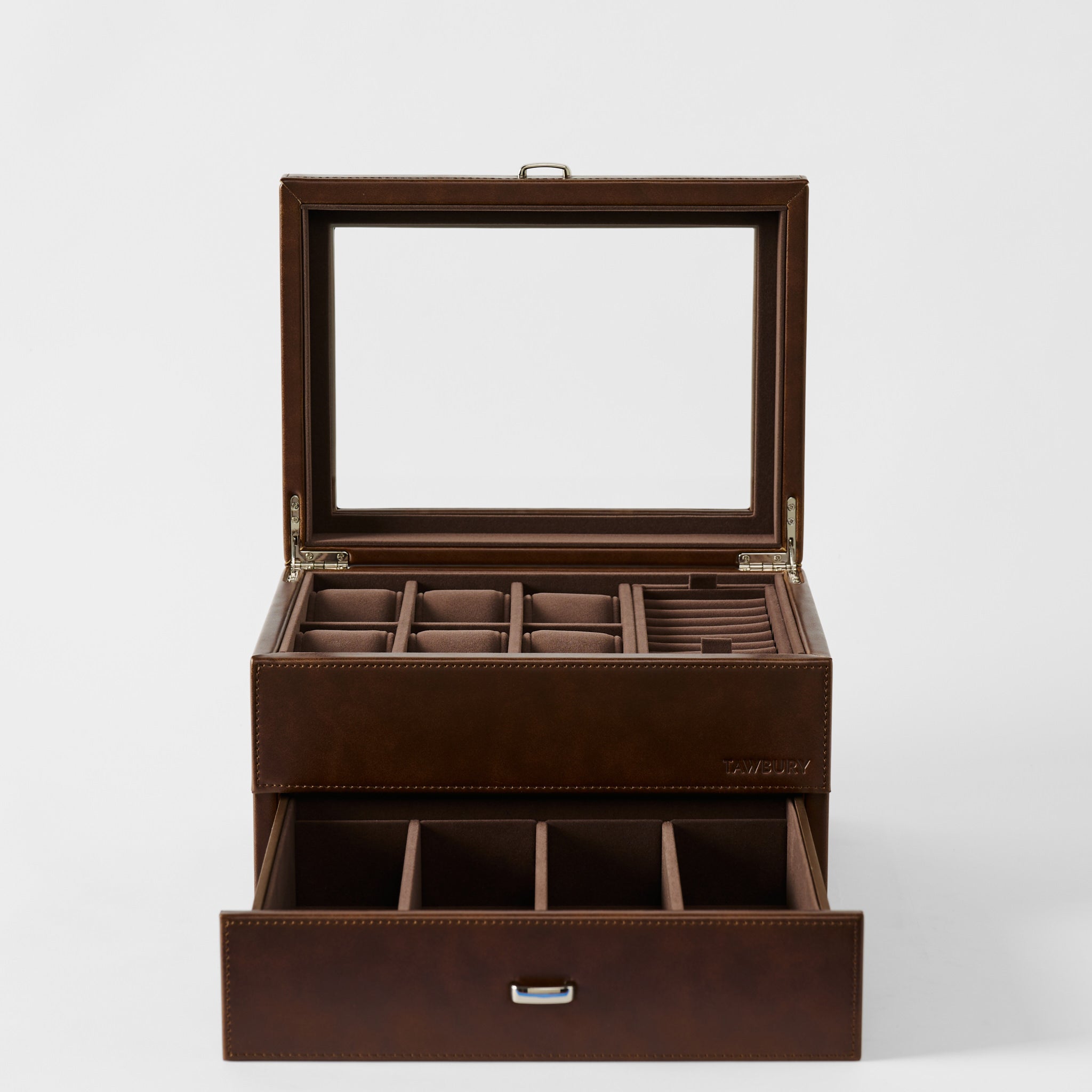 The TAWBURY Bayswater 6 Watch Jewelry Box in chestnut brown faux leather features a glass lid, multiple top compartments for rings and watches, plus an open drawer with six sections for organized watch storage.