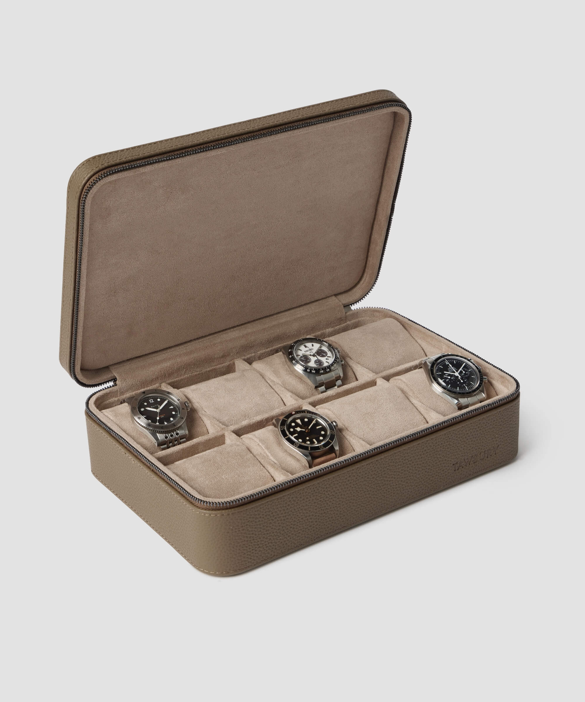 TAWBURY's Fraser 8 Watch Travel Case in Taupe features a refined leather exterior and suede interior, offering elegant storage for up to eight wristwatches, each in its own compartment. The open case beautifully displays the watches.