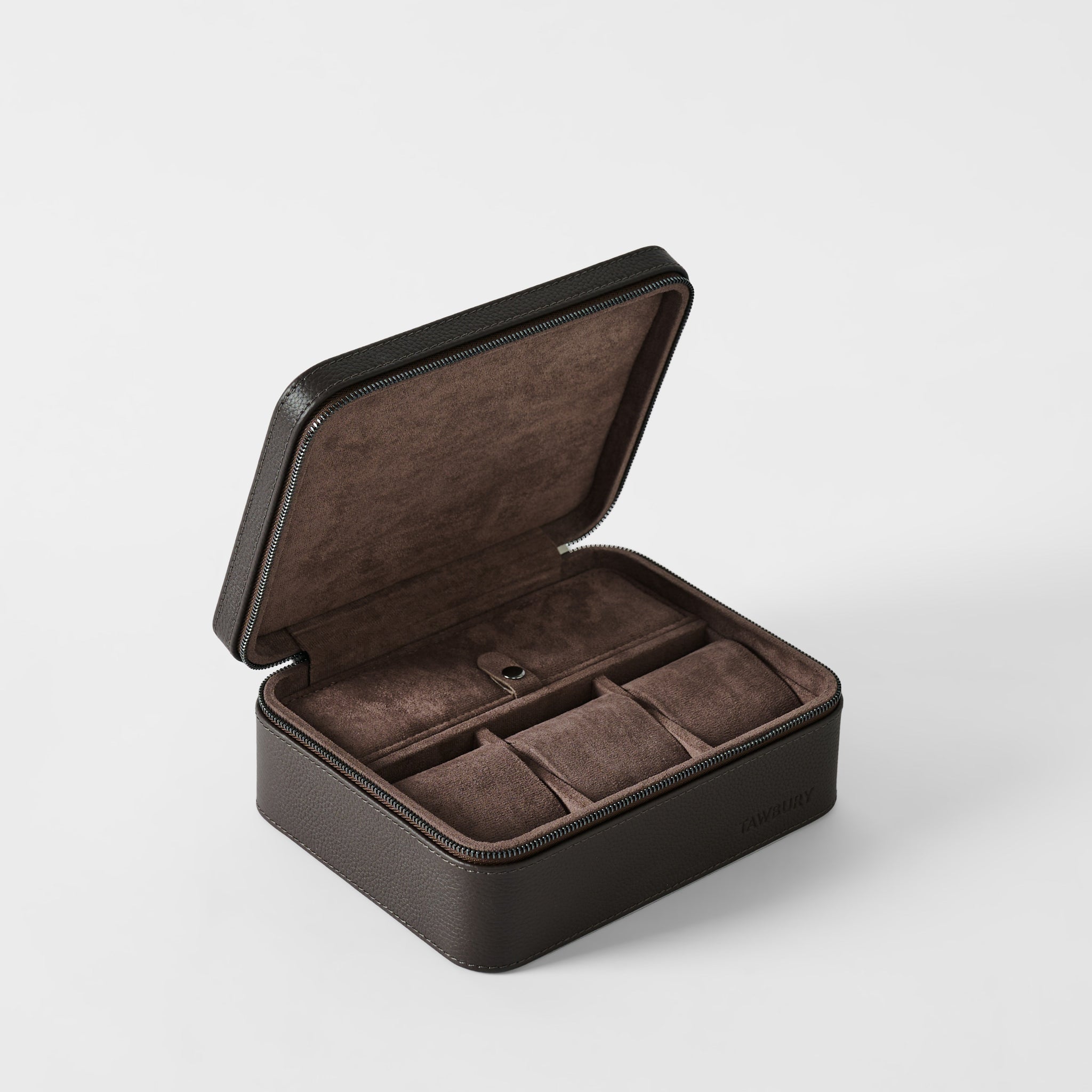 The TAWBURY Fraser 3 Watch Case with Storage in Espresso Brown features a dark leather exterior and suede-lined interior with multiple compartments—an ideal travel solution for organizing watches and accessories.