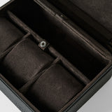 A close-up of the TAWBURY Fraser 3 Watch Case with Storage in black, featuring a soft, padded interior and compartments—ideal for securely storing watches or organizing jewelry.