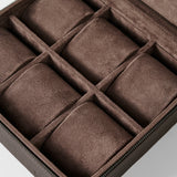 The TAWBURY Fraser 6 Watch Case - Brown features six cushioned compartments in a brown suede leather design, shown open and empty, ideal for storing and protecting watches or small accessories.