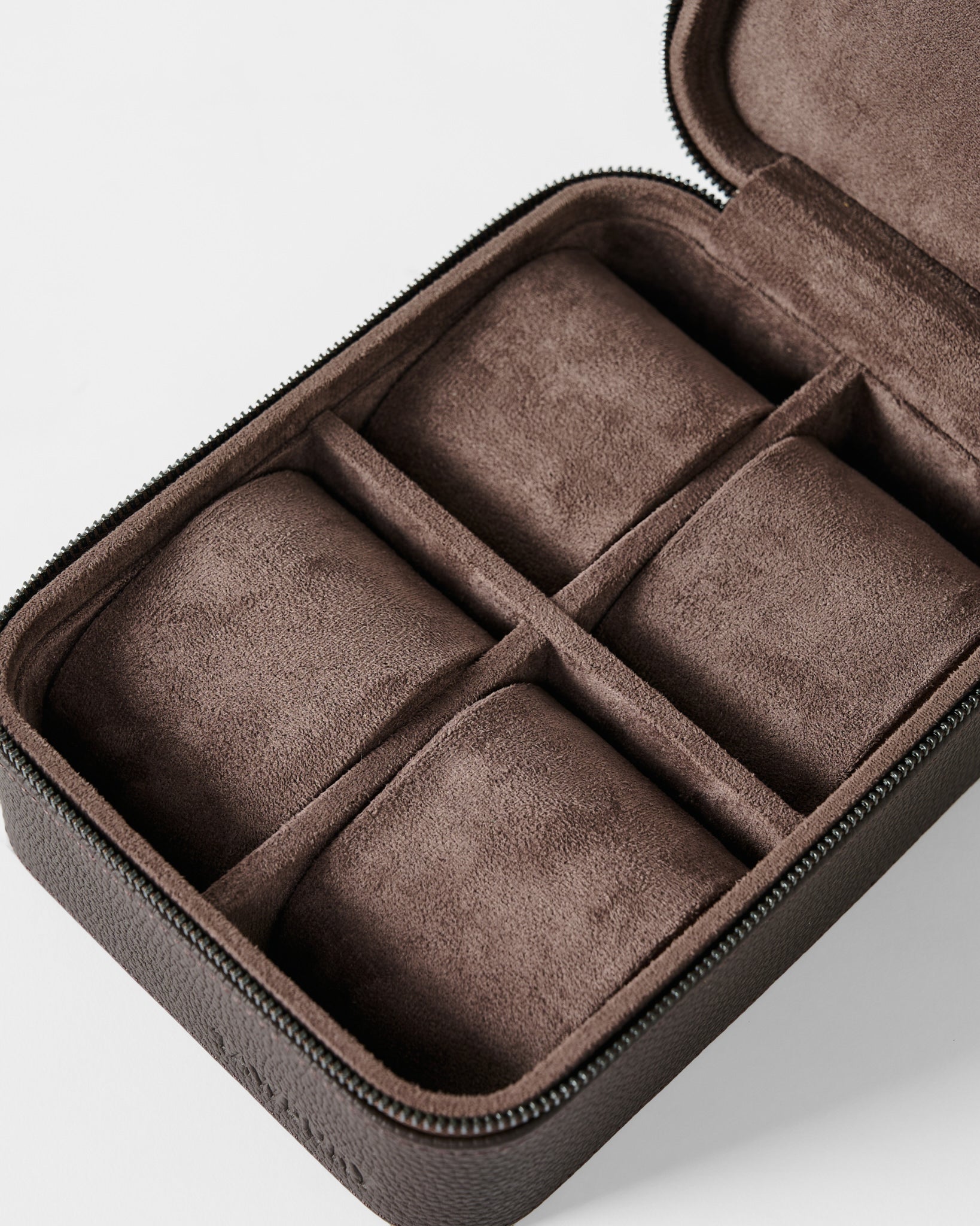 Keep your timepieces safe in the TAWBURY Fraser 4 Watch Case - Brown, featuring four cushioned compartments—ideal for watch storage or as a secure travel case for small accessories.