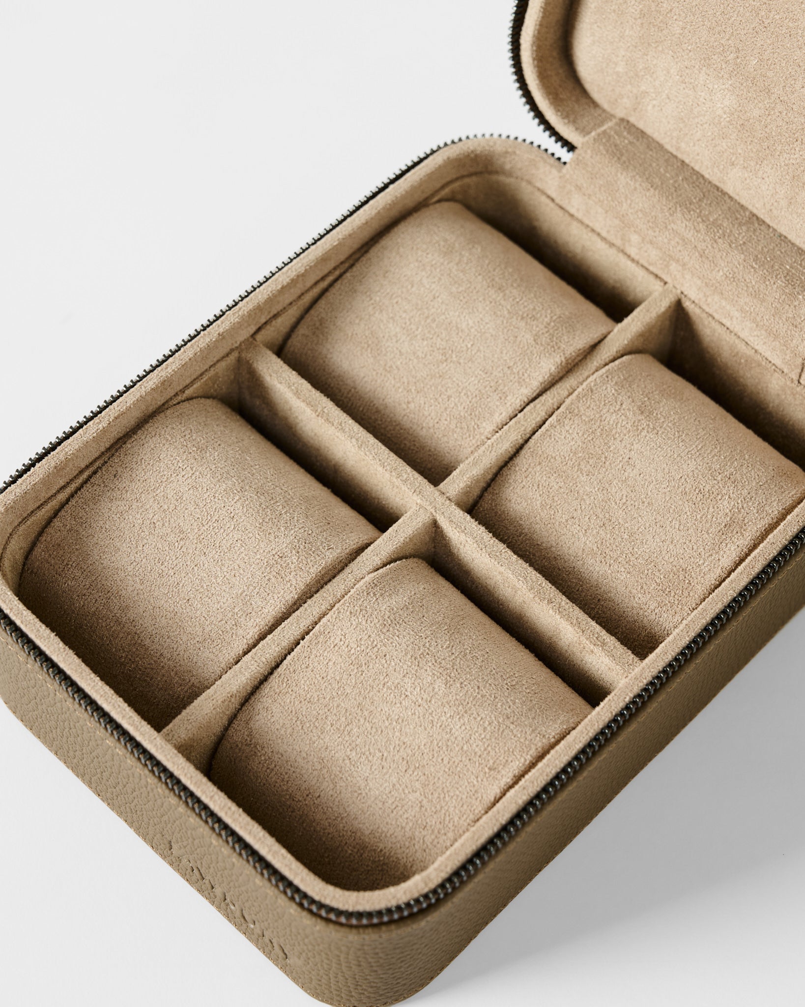 The TAWBURY Fraser 4 Watch Case in taupe features four cushioned compartments, ideal for storing and protecting your watches or small accessories at home or on the go.