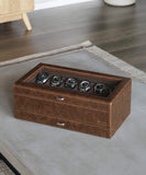 A TAWBURY Bayswater 12 Slot Watch Box with Drawer - Brown, designed for timepieces, sitting on top of a table.