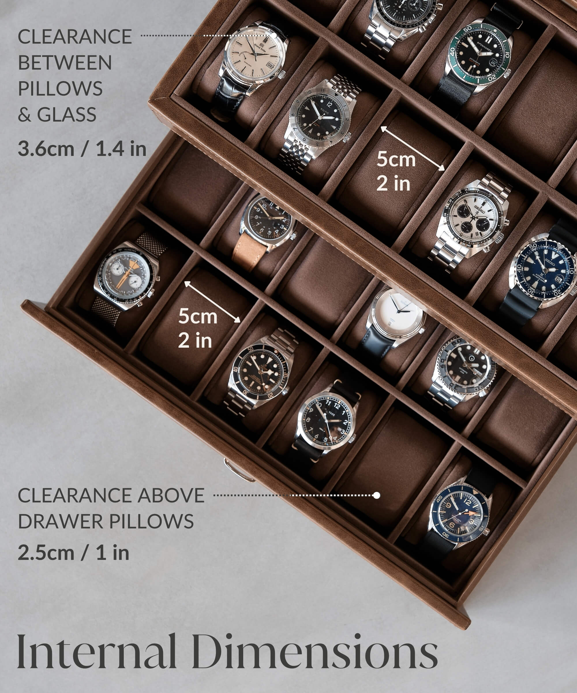 An image of a TAWBURY Bayswater 24 Slot Watch Box with Drawer - Brown designed to organize and protect different watches inside.