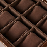Close-up of the TAWBURY Bayswater 12 Slot Watch Box with Storage in brown, featuring a velvet-lined interior and individual padded compartments for elegant watch storage.