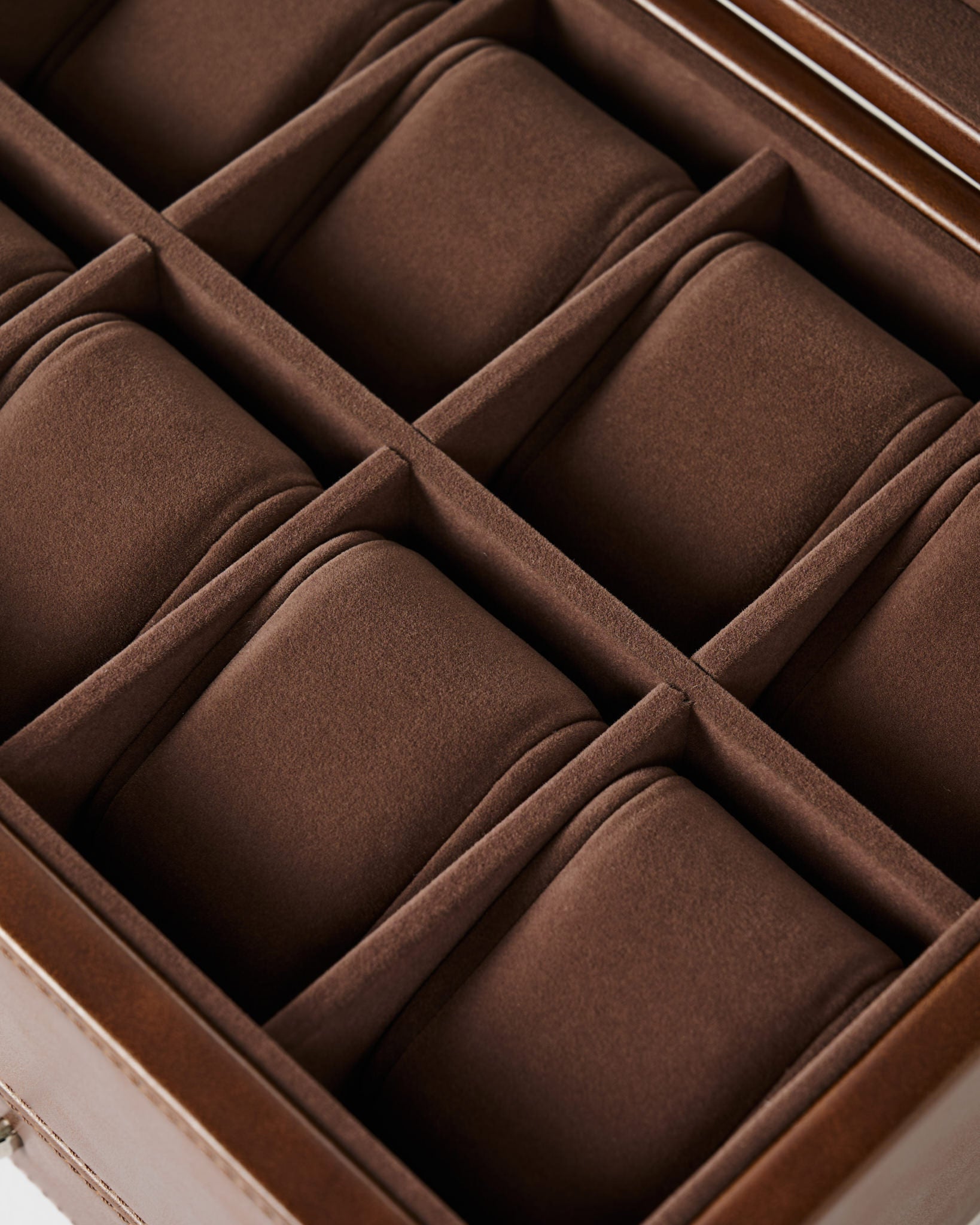 The TAWBURY Bayswater 8 Slot Watch Box with Storage features brown velvet-lined compartments and faux leather accents, offering elegant organization for multiple watches or jewelry items.
