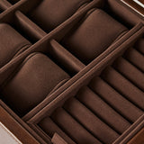 Close-up of the TAWBURY Bayswater 6 Watch Jewelry Box in brown velvet, featuring compartments for storing watches and rings.