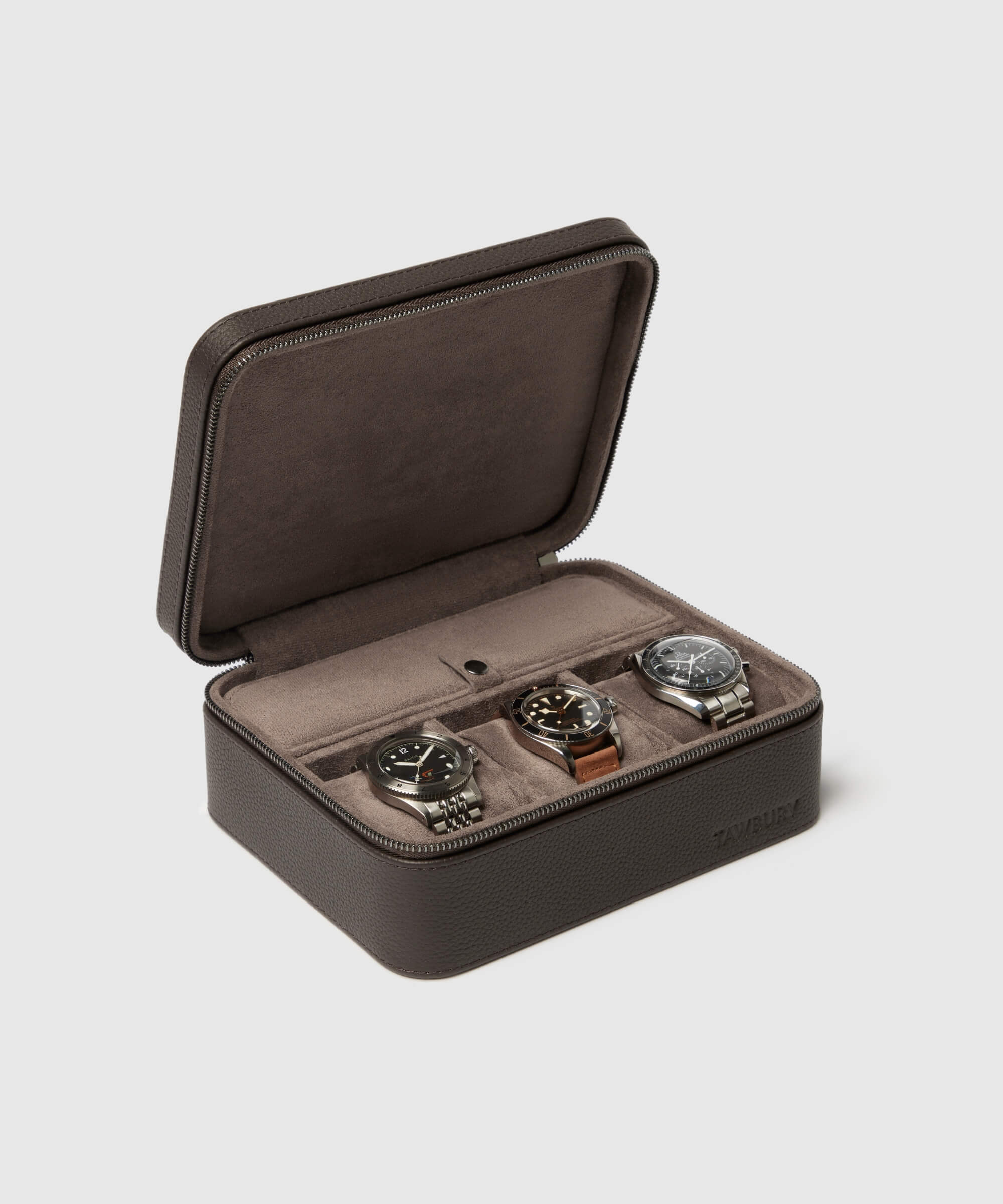 A Fraser 3 Watch Travel Case with Storage - Brown by TAWBURY with three watches inside.