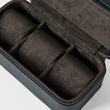 The TAWBURY Fraser 3 Watch Case - Black features three padded compartments and dark soft lining in a sleek zippered leather design—perfect for elegant watch storage at home or while traveling.