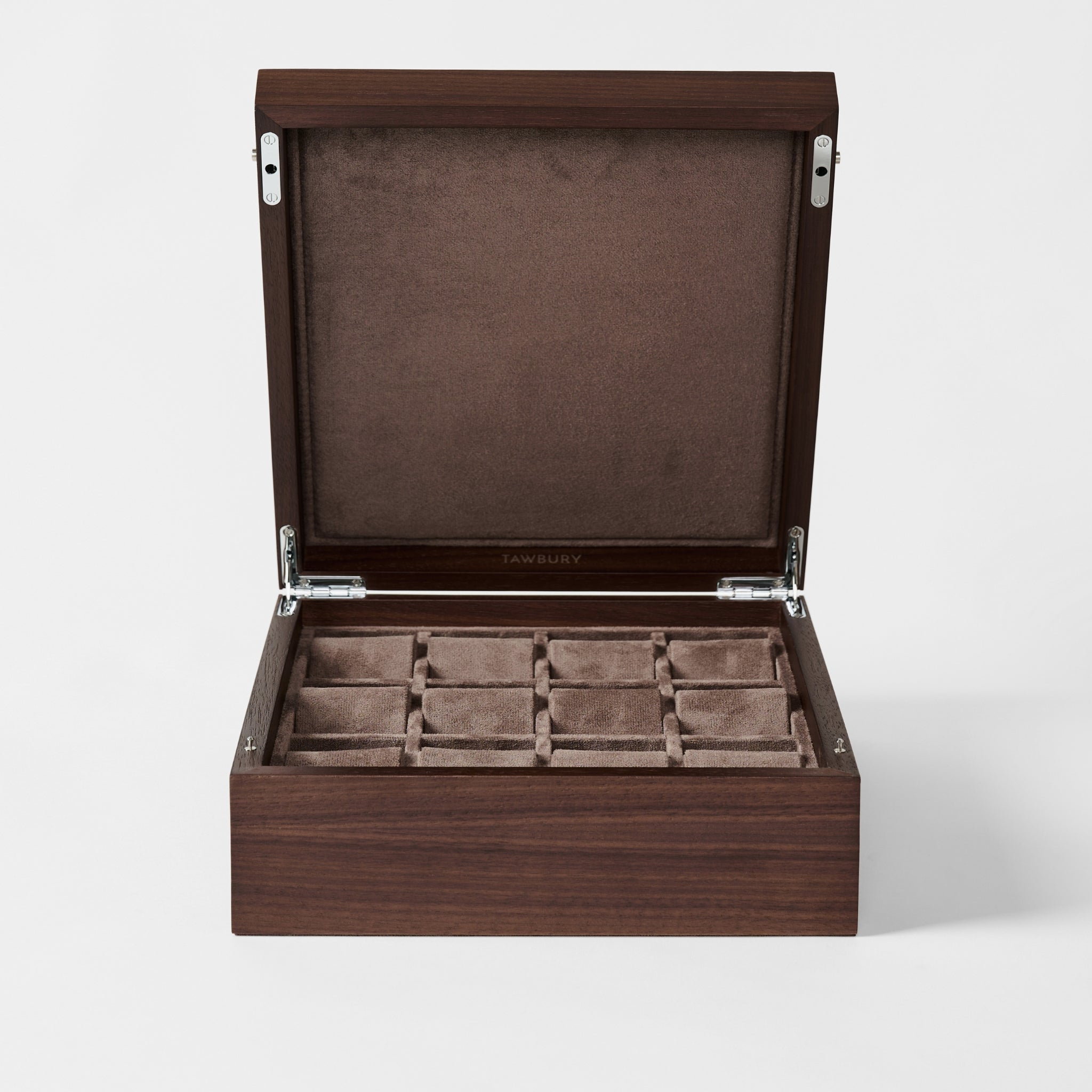 The TAWBURY Grove 12 Slot Wooden Watch Box in dark walnut wood features a closed lid and velvet-lined compartments, perfect for storing watches or jewelry.