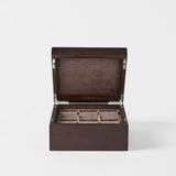 The TAWBURY Grove 6 Slot Wooden Watch Box in dark walnut features a closed lid and a soft suede-lined interior with individual slots—ideal for organizing and displaying your watch collection.