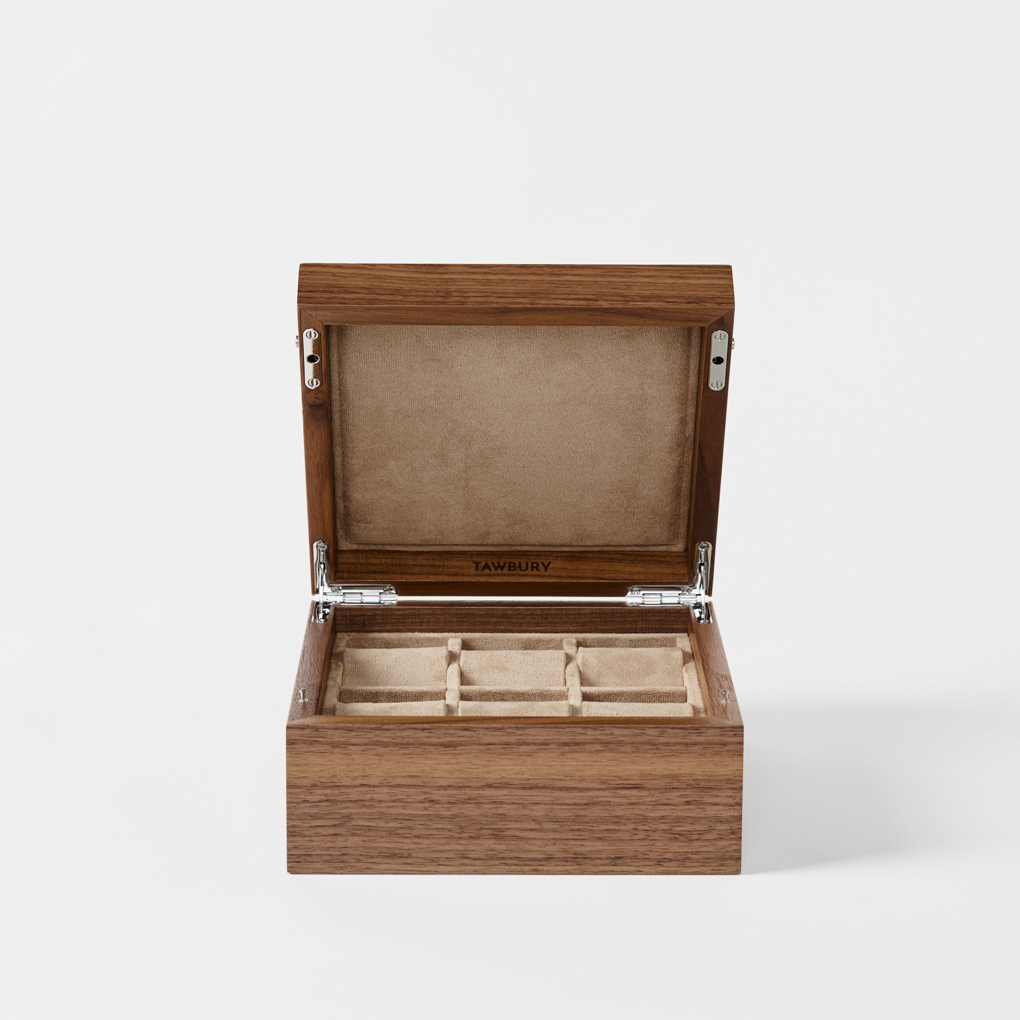 The TAWBURY Grove 6 Slot Wooden Watch Box in classic walnut features six velvet-lined compartments, perfect for organizing your collection while keeping it protected with a closed lid.
