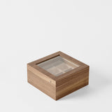 TAWBURY Grove 6 Slot Wooden Watch Box in classic walnut wood features a glass lid and divided compartments, displayed on a white background.