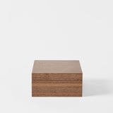 A square, closed TAWBURY Grove 6 Slot Wooden Watch Box in classic walnut wood is centered against a white background—ideal for your collection or as an elegant watch display box.