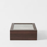 The TAWBURY Grove 12 Slot Wooden Watch Box in dark walnut wood with a glass lid, shown against a plain white background.