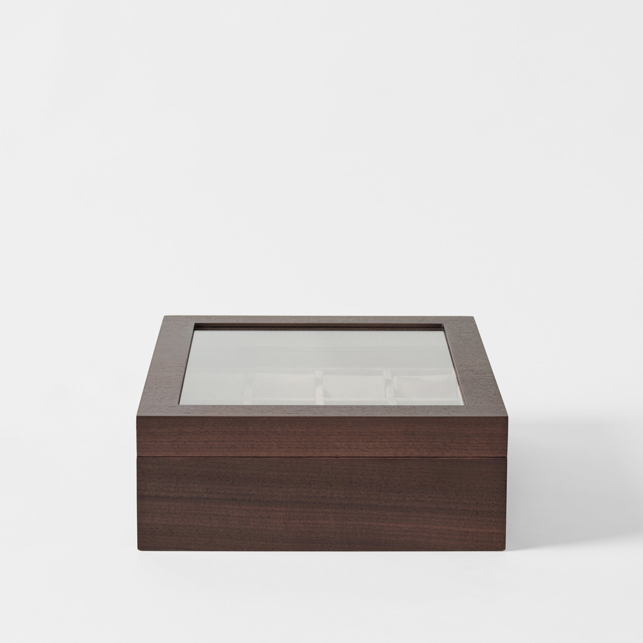 The TAWBURY Grove 12 Slot Wooden Watch Box in dark walnut wood with a glass lid, shown against a plain white background.