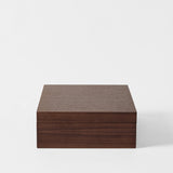 The TAWBURY Grove 12 Slot Wooden Watch Box features a closed lid and a smooth, dark walnut wood finish, displayed against a plain white background.