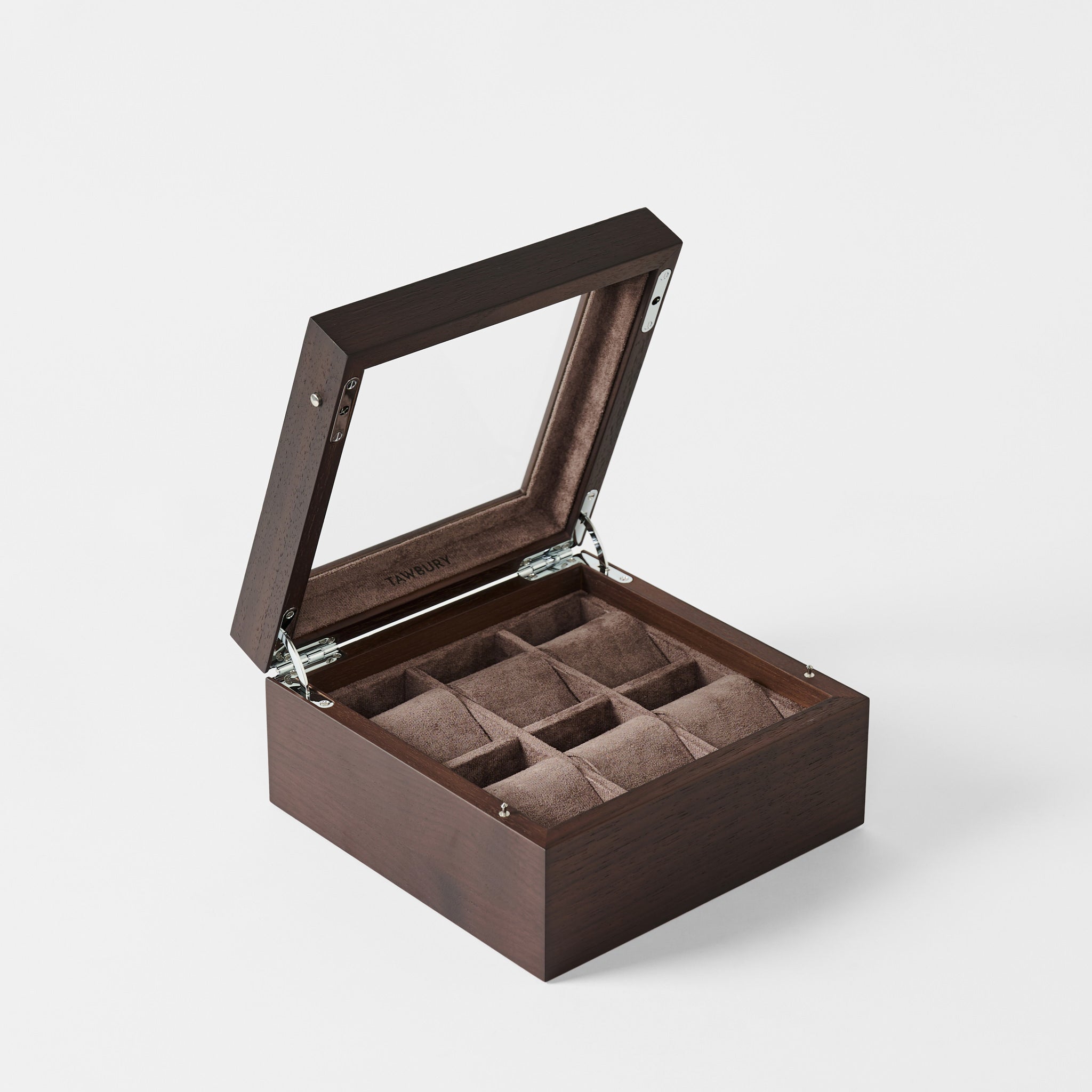The TAWBURY Grove 6 Slot Wooden Watch Box in dark walnut wood features a glass lid and opens to reveal six cushioned compartments for storing watches or accessories.