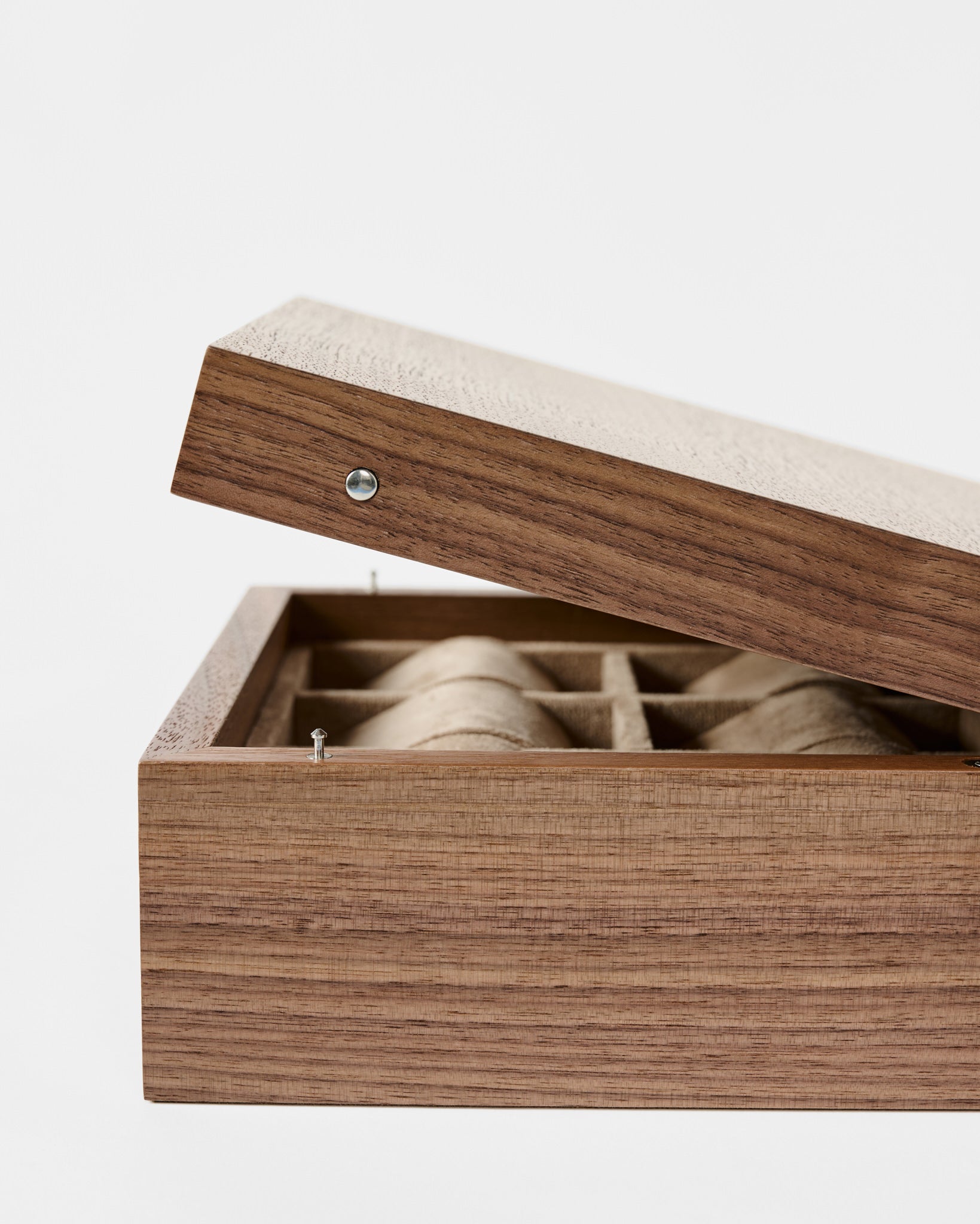 A light walnut TAWBURY Grove 6 Slot Wooden Watch Box with a solid lid reveals a beige-lined, compartmentalized interior—ideal for stylishly displaying or storing watches.