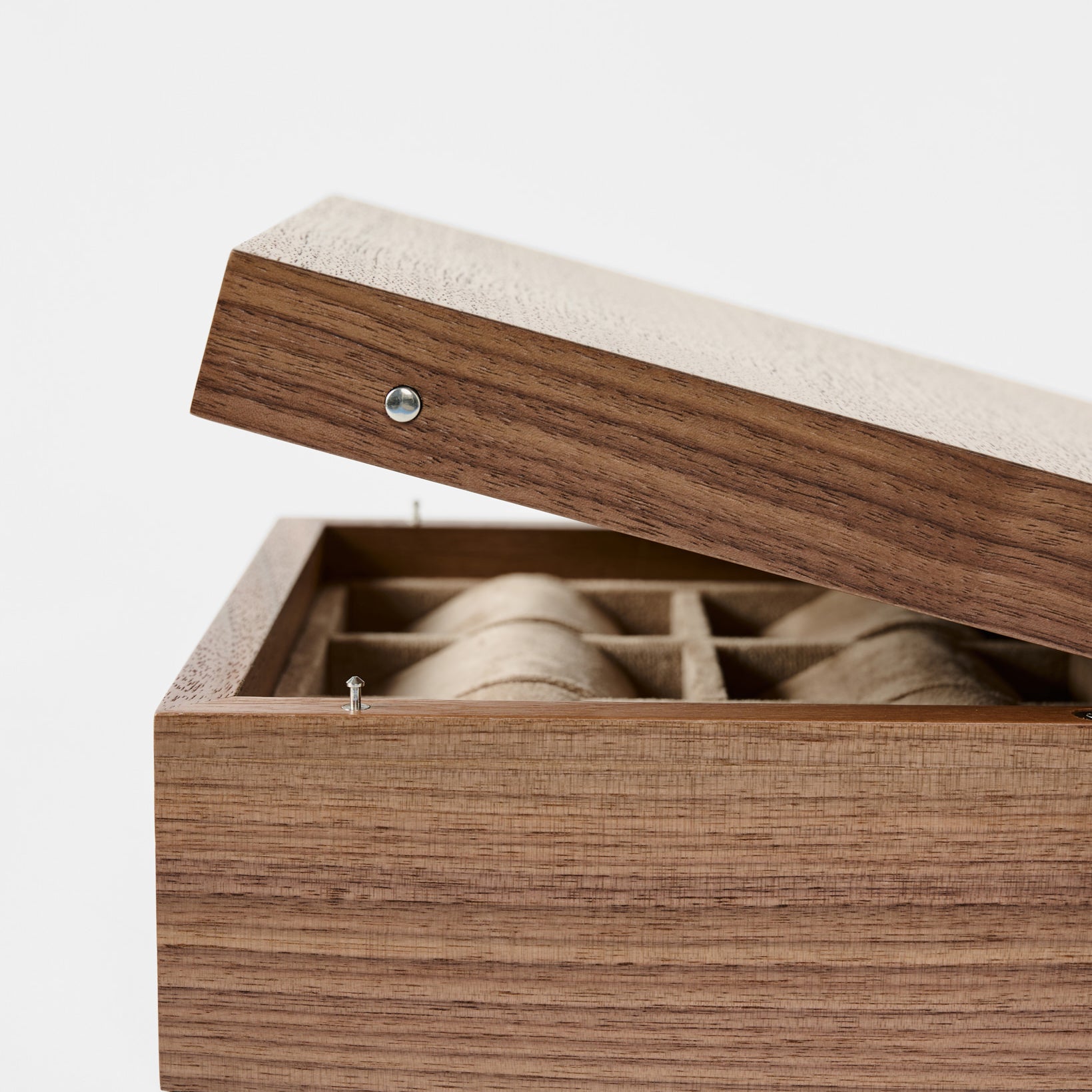 A light walnut TAWBURY Grove 6 Slot Wooden Watch Box with a solid lid reveals a beige-lined, compartmentalized interior—ideal for stylishly displaying or storing watches.