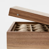 The TAWBURY Grove 12 Slot Wooden Watch Box in Light Walnut features a solid lid and multiple cushioned compartments, making it the ideal organizer for watch collectors.
